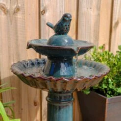 Vogel 27 1/4" High Teal Blue Ceramic Bird Garden Fountain 11 Vogel 27 1/4" High Teal Blue Ceramic Bird Garden Fountain -Kenroy Shop vogel 27 and one quarter inch high teal blue ceramic bird garden fountain 78f10views2